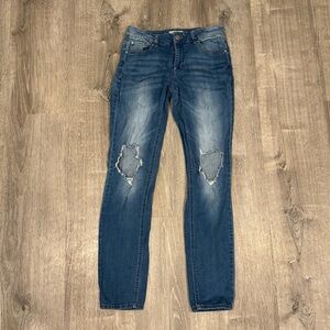 Women's Distressed Blue Jeans